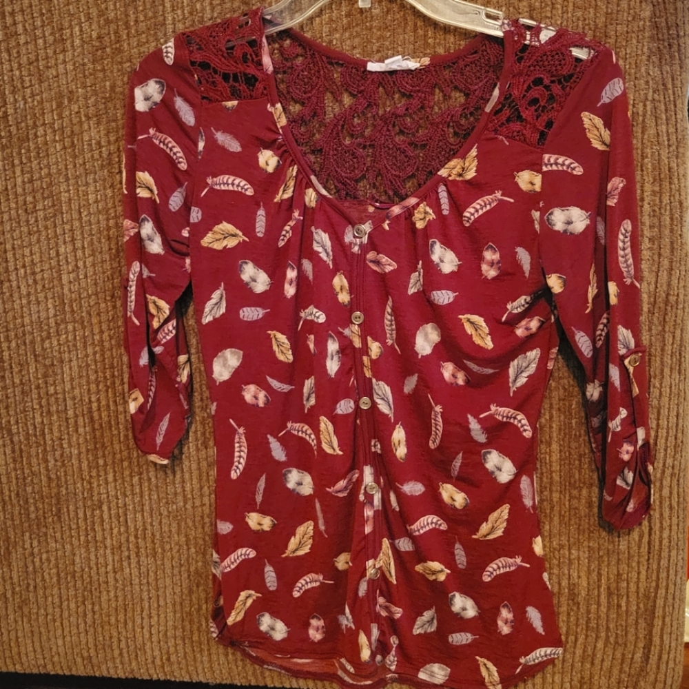 A'gaci feather top